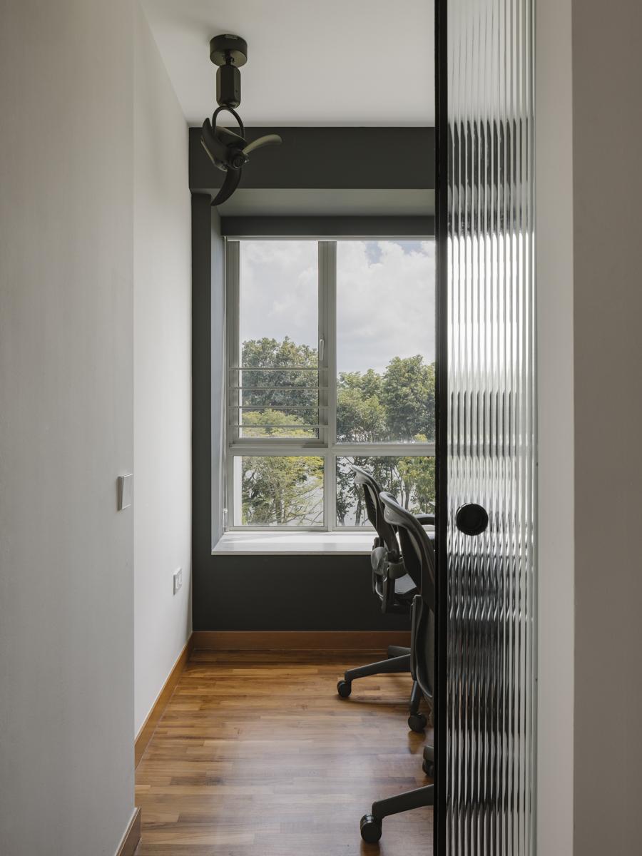 Modern Home Office with Bay Window and Desk