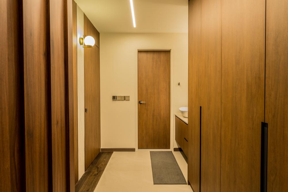 Transitional Walk-in Wardrobe with Feature Wall and Wardrobe