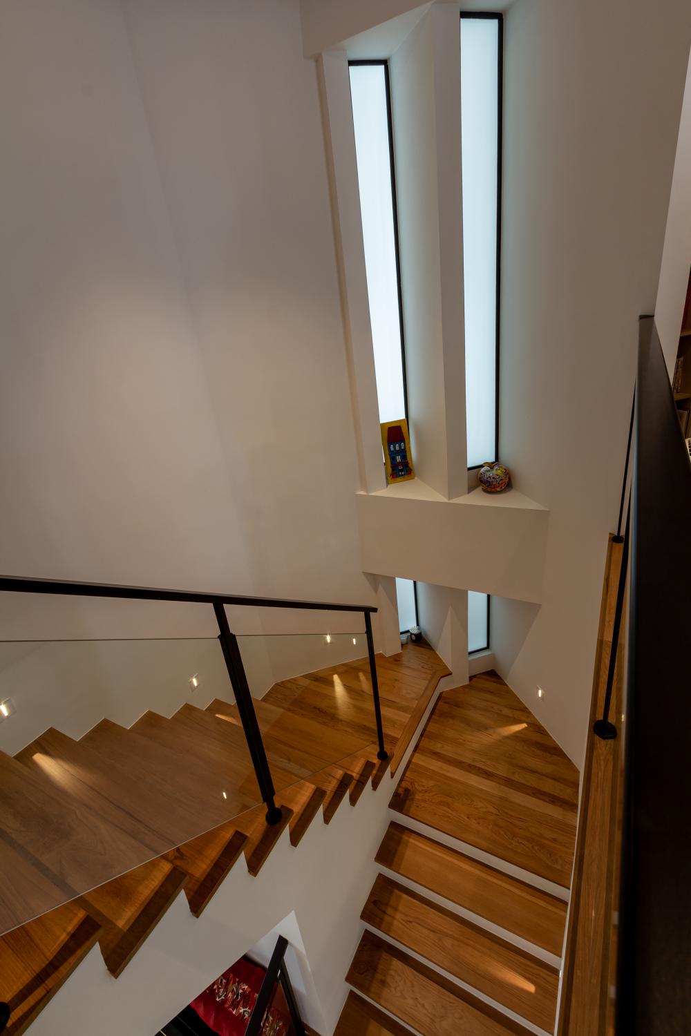 Modern Entryway with Mirror and Stools
