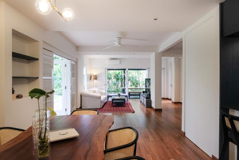 Vintage Living Room with Parquet Floor and TV Console