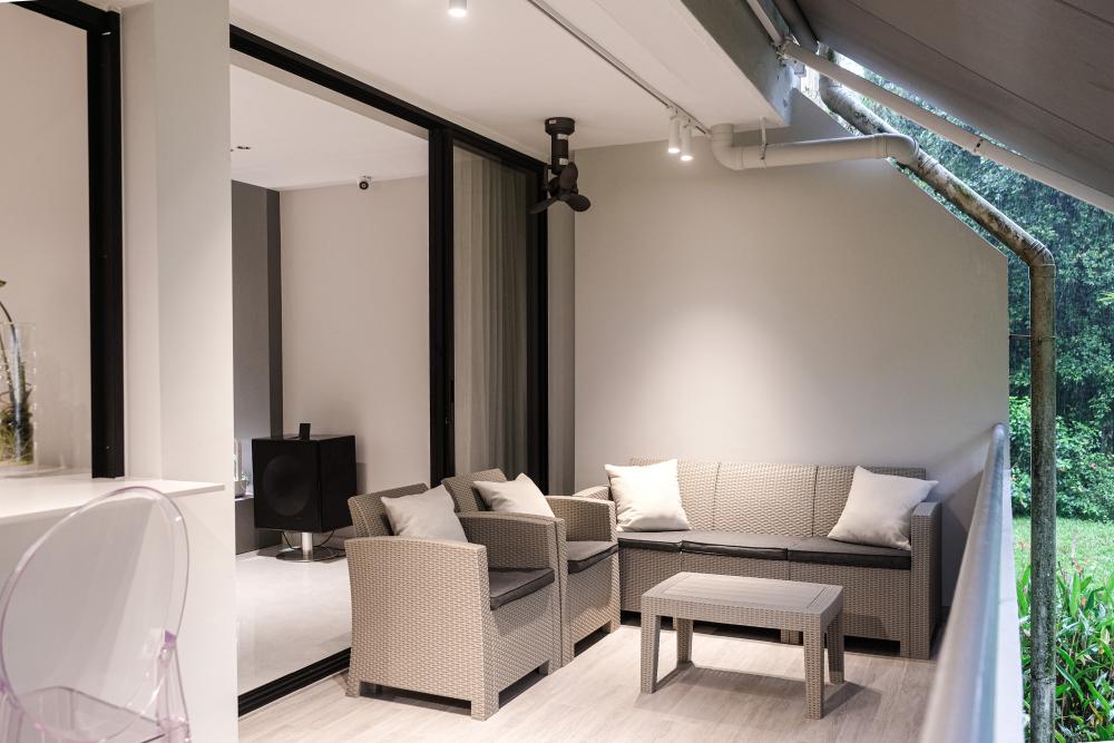 Modern Balcony with Outdoor Table and Outdoor Chairs
