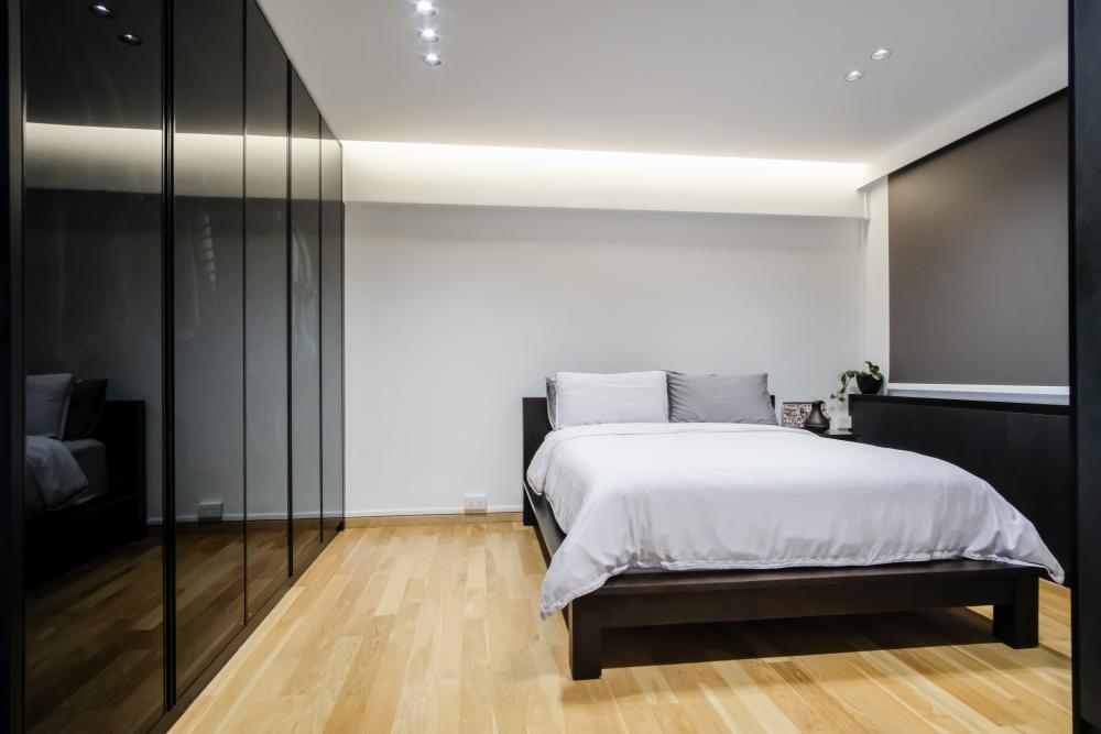 Eclectic Bedroom with Wood Flooring and Glass Door