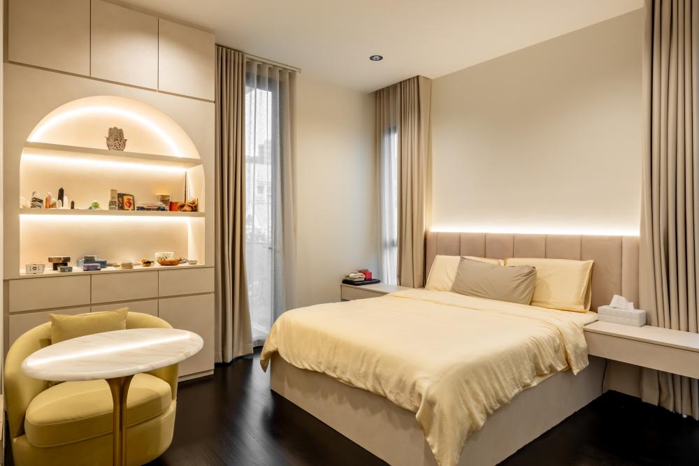 Eclectic Bedroom with Bookshelf and Sofa