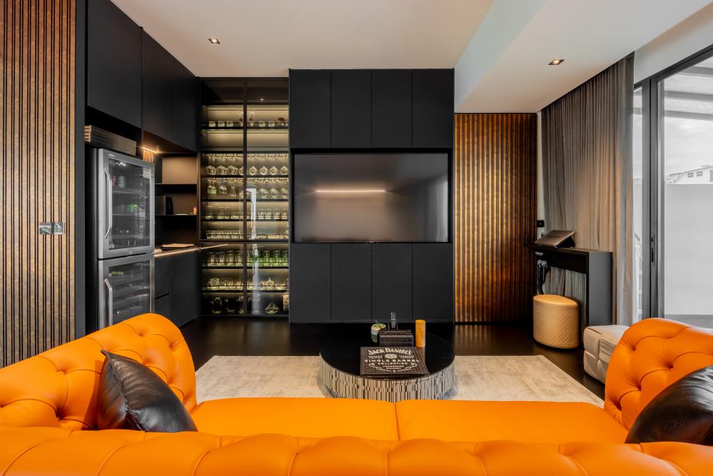 Eclectic Home Theatre with Glass Door and Sofa