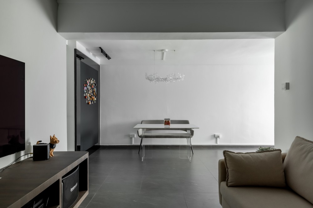 Modern Living Room with Homogeneous Tiles and TV Console