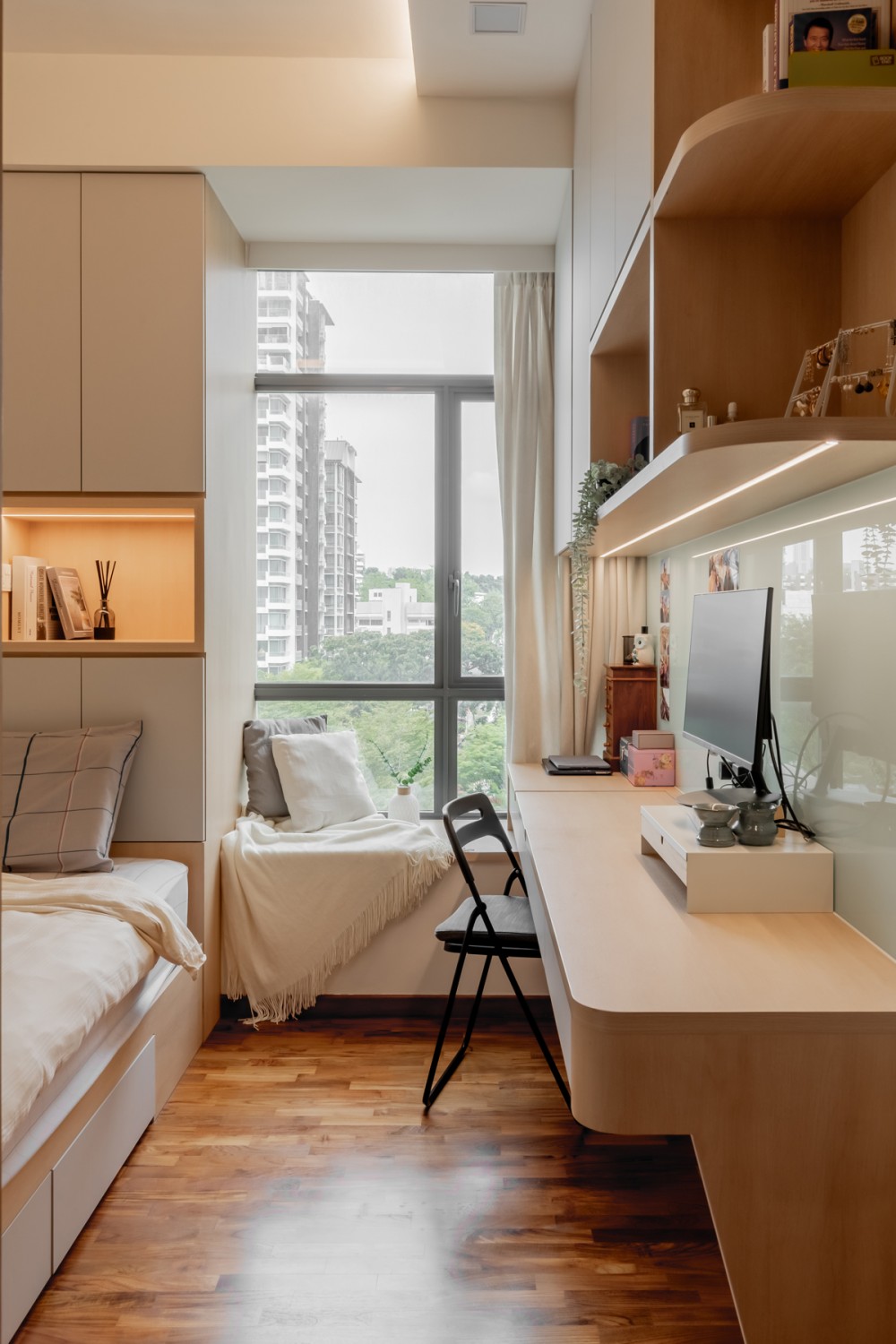 Contemporary Bedroom with Bookshelf and Bay Window