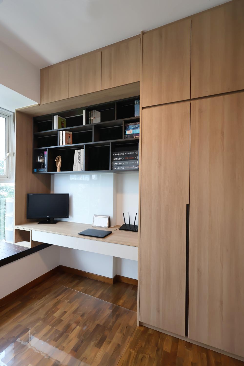 Contemporary Home Office with Bookshelf and Desk