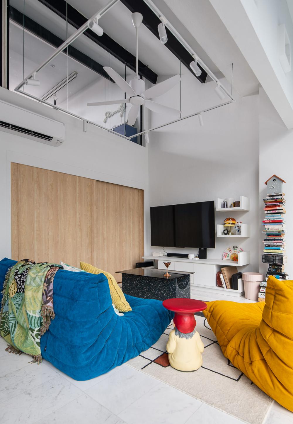 Eclectic Living Room with Bookshelf and TV Console