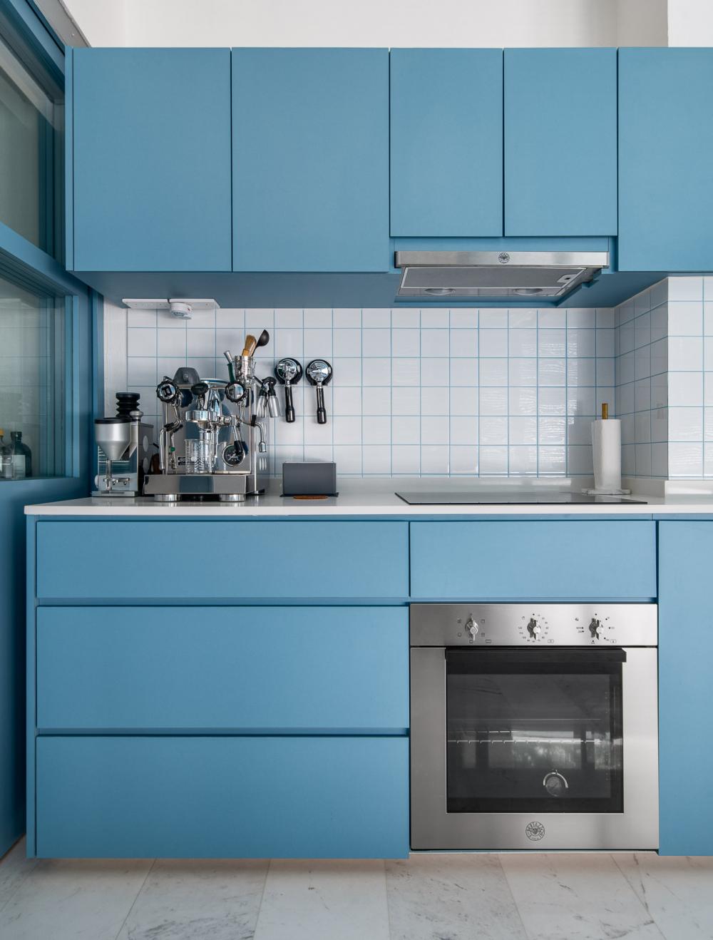 Eclectic Kitchen with Countertop and Herringbone Tiling