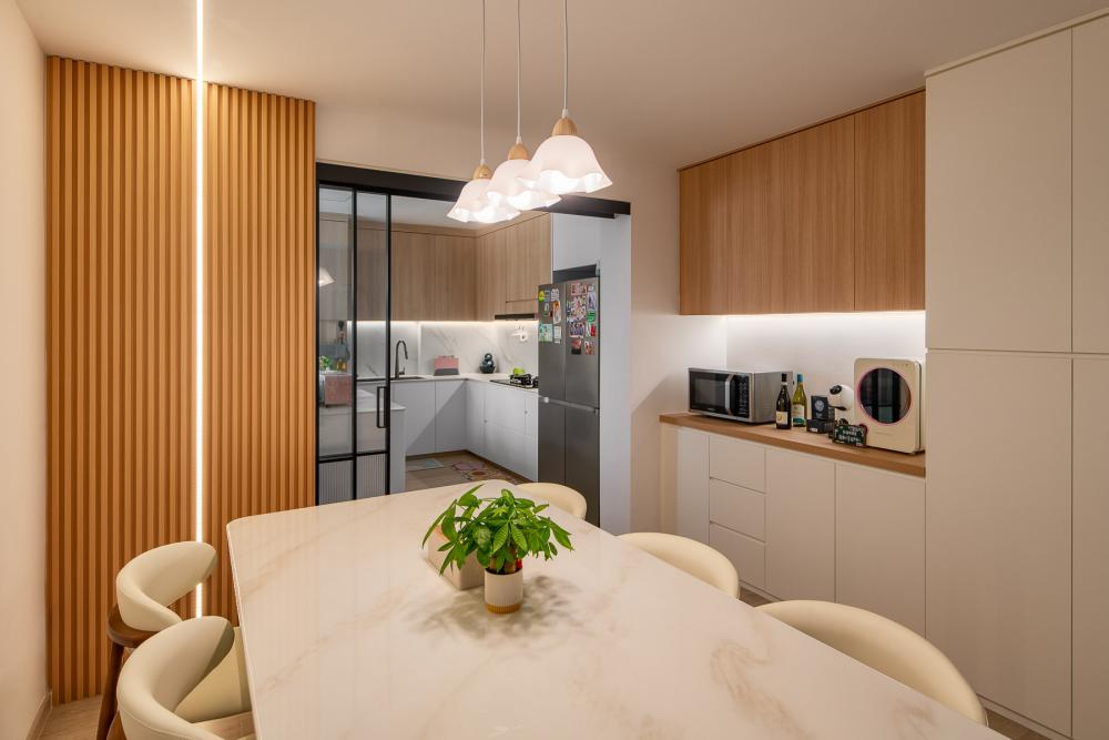 Modern Dining Room with Cove Lighting and Chandelier
