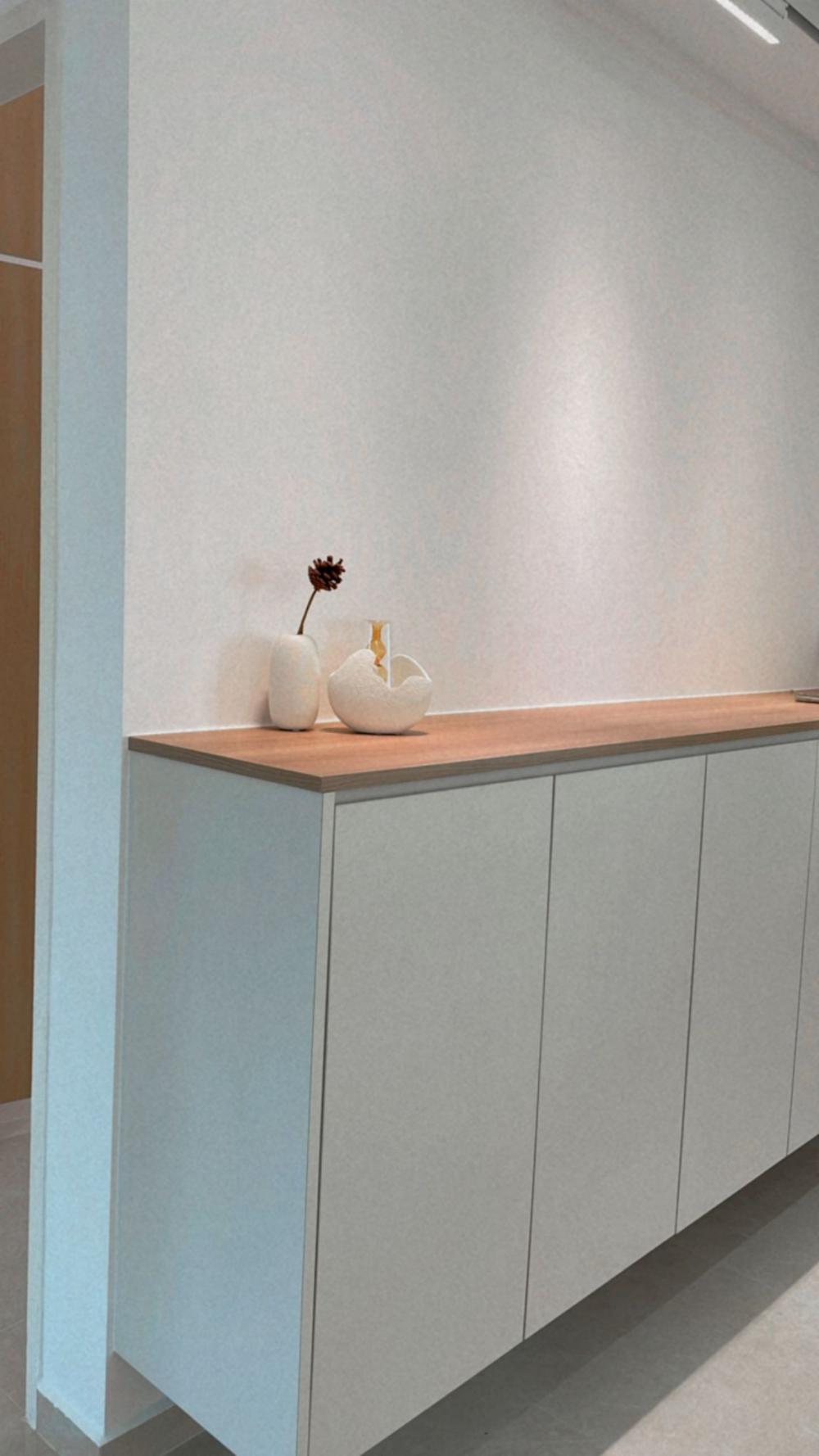 Scandinavian Entryway with Shoe Rack and Storage Cabinets