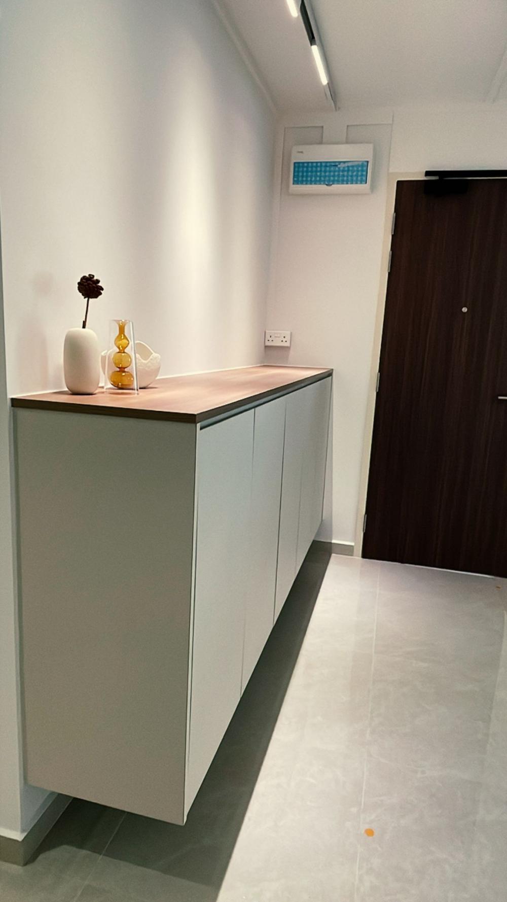 Scandinavian Entryway with Shoe Rack and Storage Cabinets