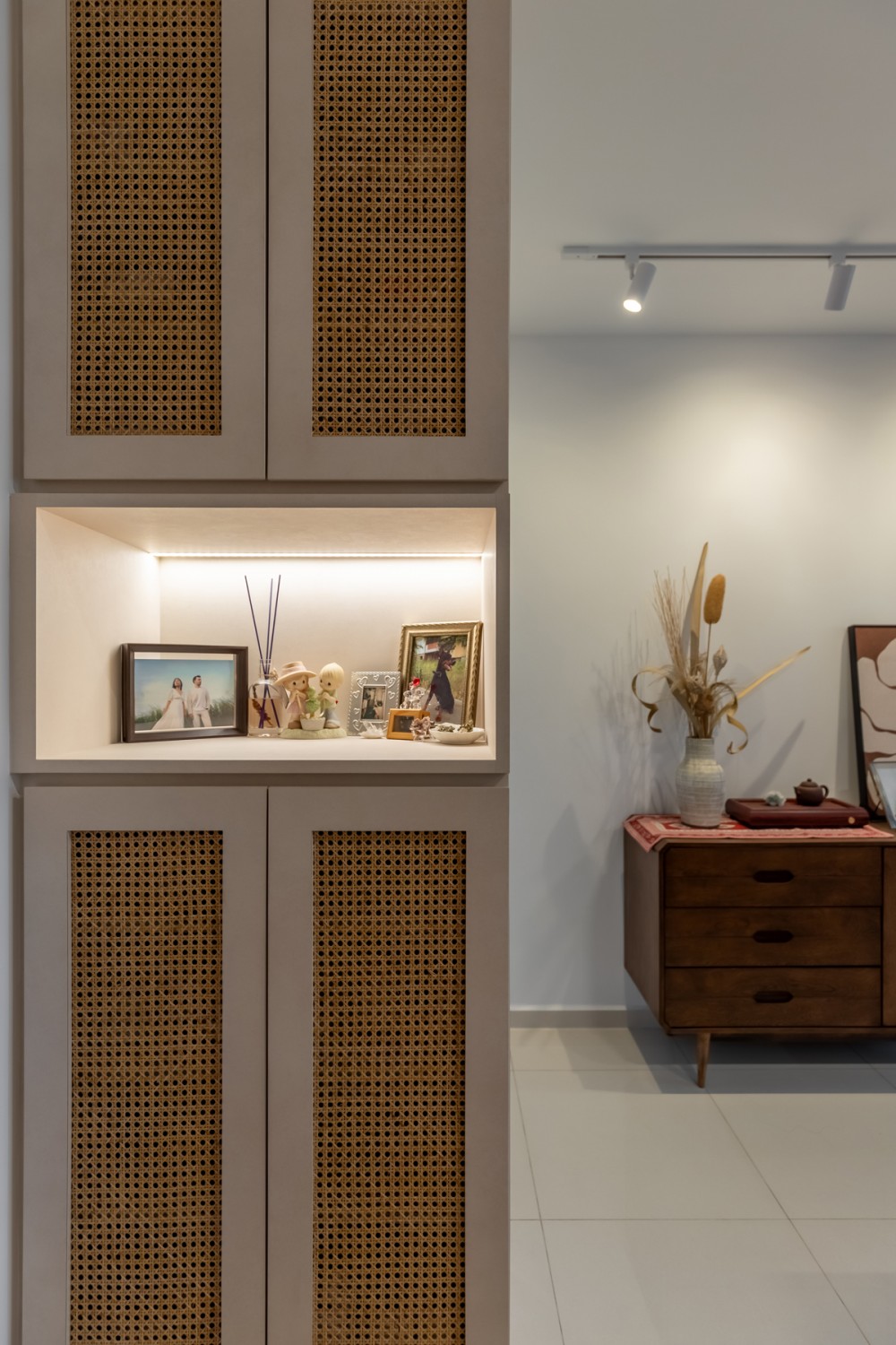 Scandinavian Entryway with Artwork and Planters