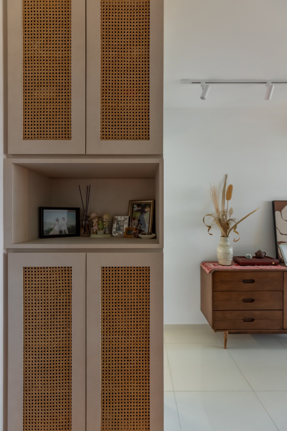Scandinavian Entryway with Artwork and Planters