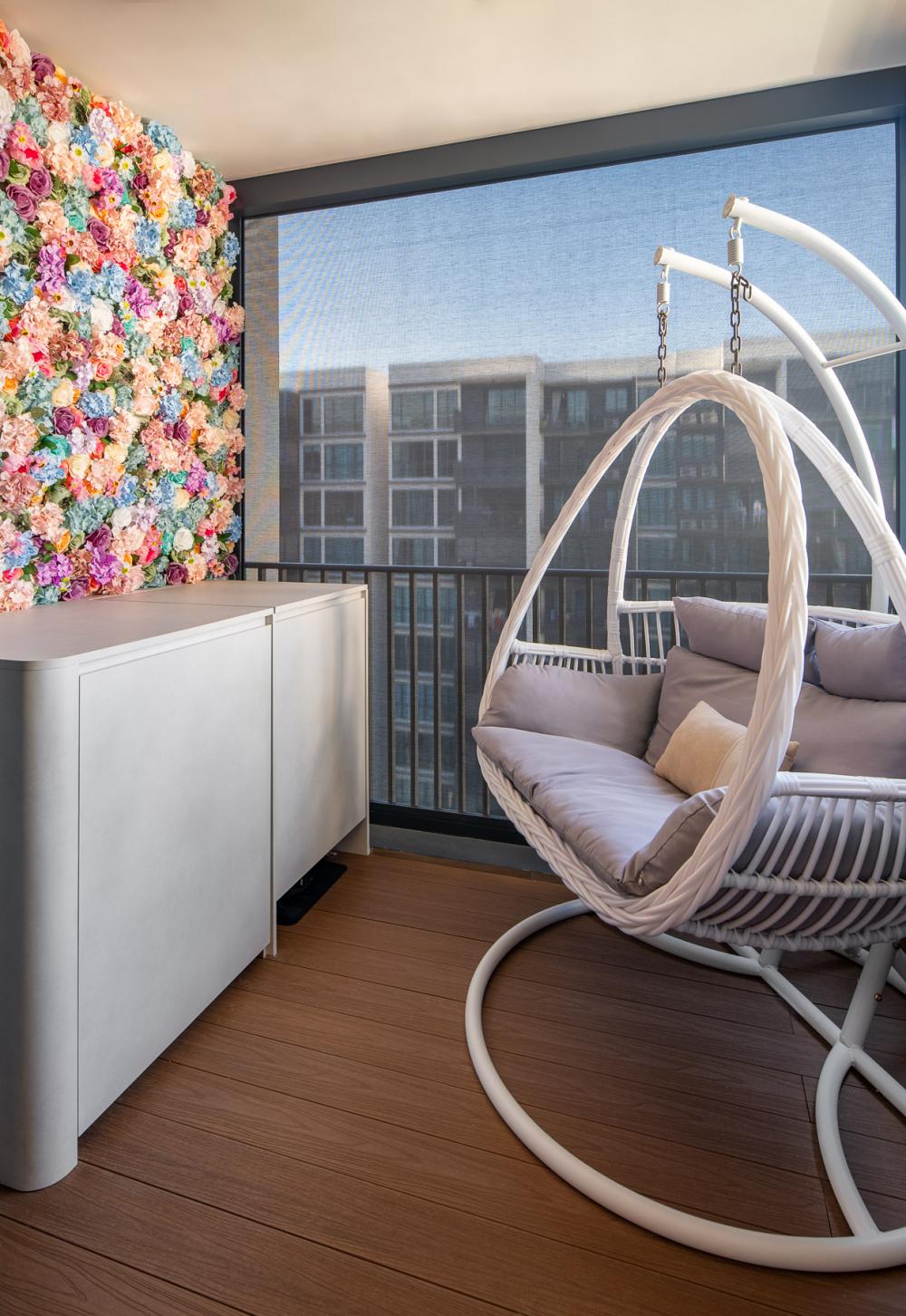 Contemporary Balcony with Window Seat and Outdoor Chairs