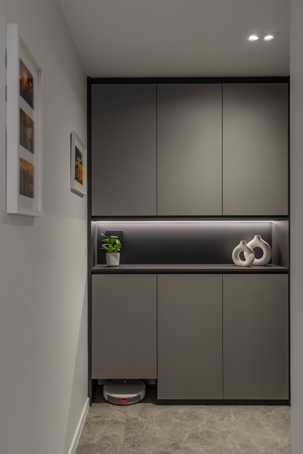 Modern Entryway with Ceiling Light and Display Cabinets