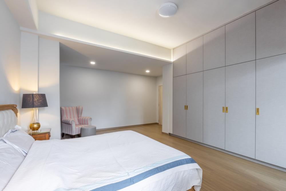 Asian Bedroom with Drop Light and Ceiling Light