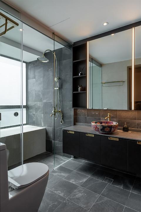 Modern Bathroom with Herringbone Tiling and Cement Floor