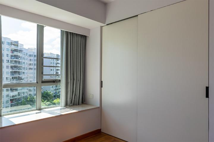Modern Bedroom with Cement Floor and Cove Lighting