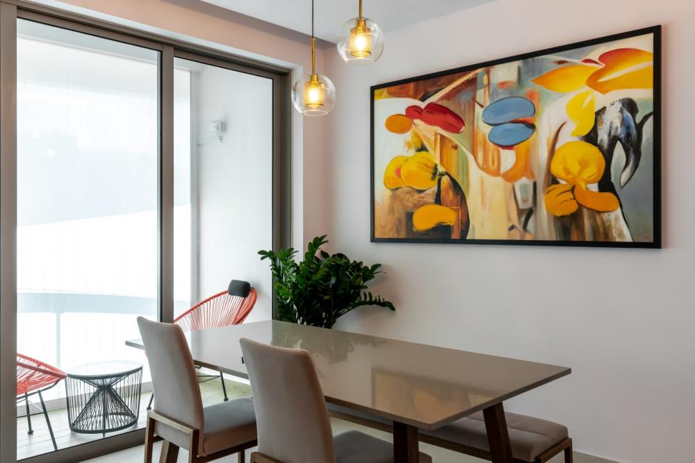 Modern Dining Room with Drop Light and Dining Table