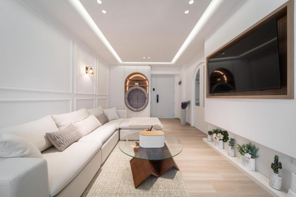 Scandinavian Living Room with Bookshelf and Downlights