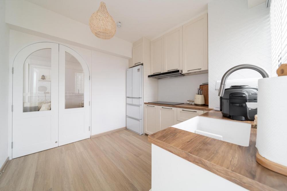 Scandinavian Kitchen with Countertop and Herringbone Tiling