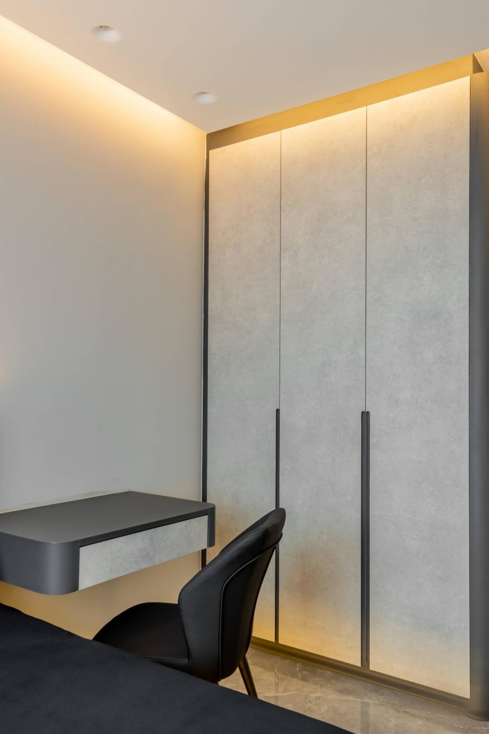 Modern Bedroom with Cove Lighting and Wardrobe