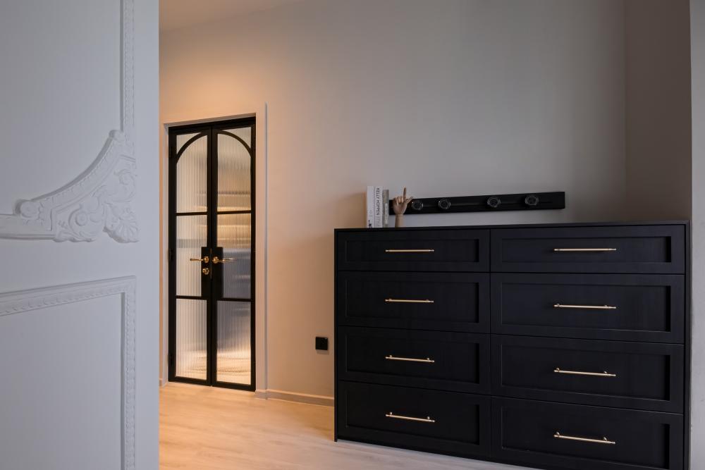 Modern Living Room with Ceiling Light and Display Cabinets