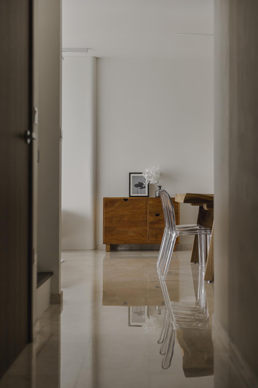 Contemporary Hallway with Bookshelf and Artwork