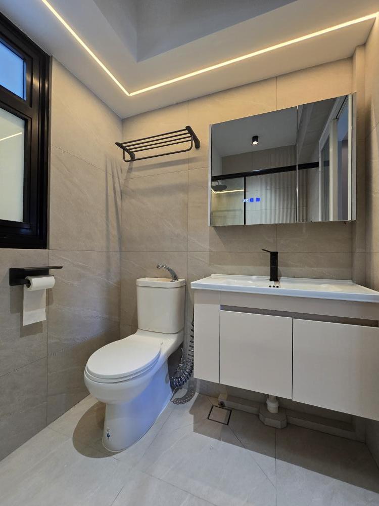 Scandinavian Bathroom with Countertop and Mirror