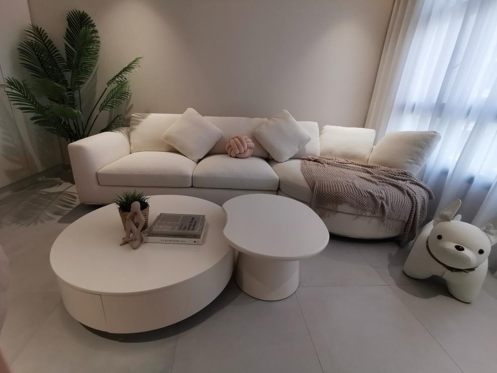 Scandinavian Living Room with Homogeneous Tiles and Curtain