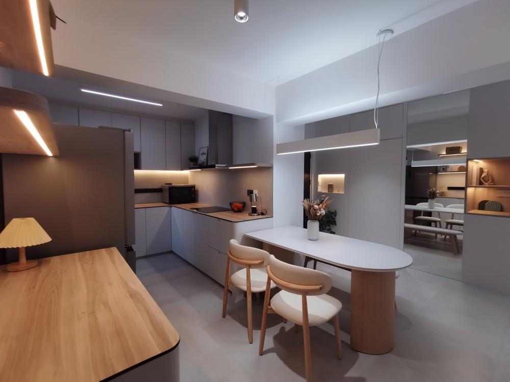 Scandinavian Dining Room with Cove Lighting and Dining Chairs