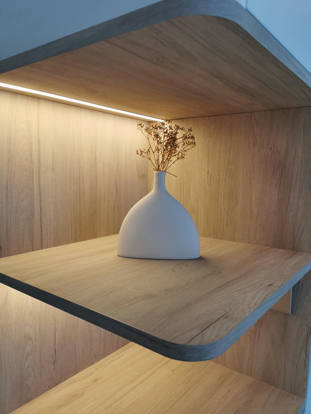 Scandinavian Hallway with Bookshelf and Artwork