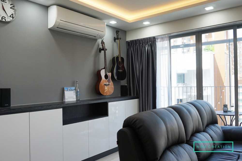 Modern Living Room with Bookshelf and Settee