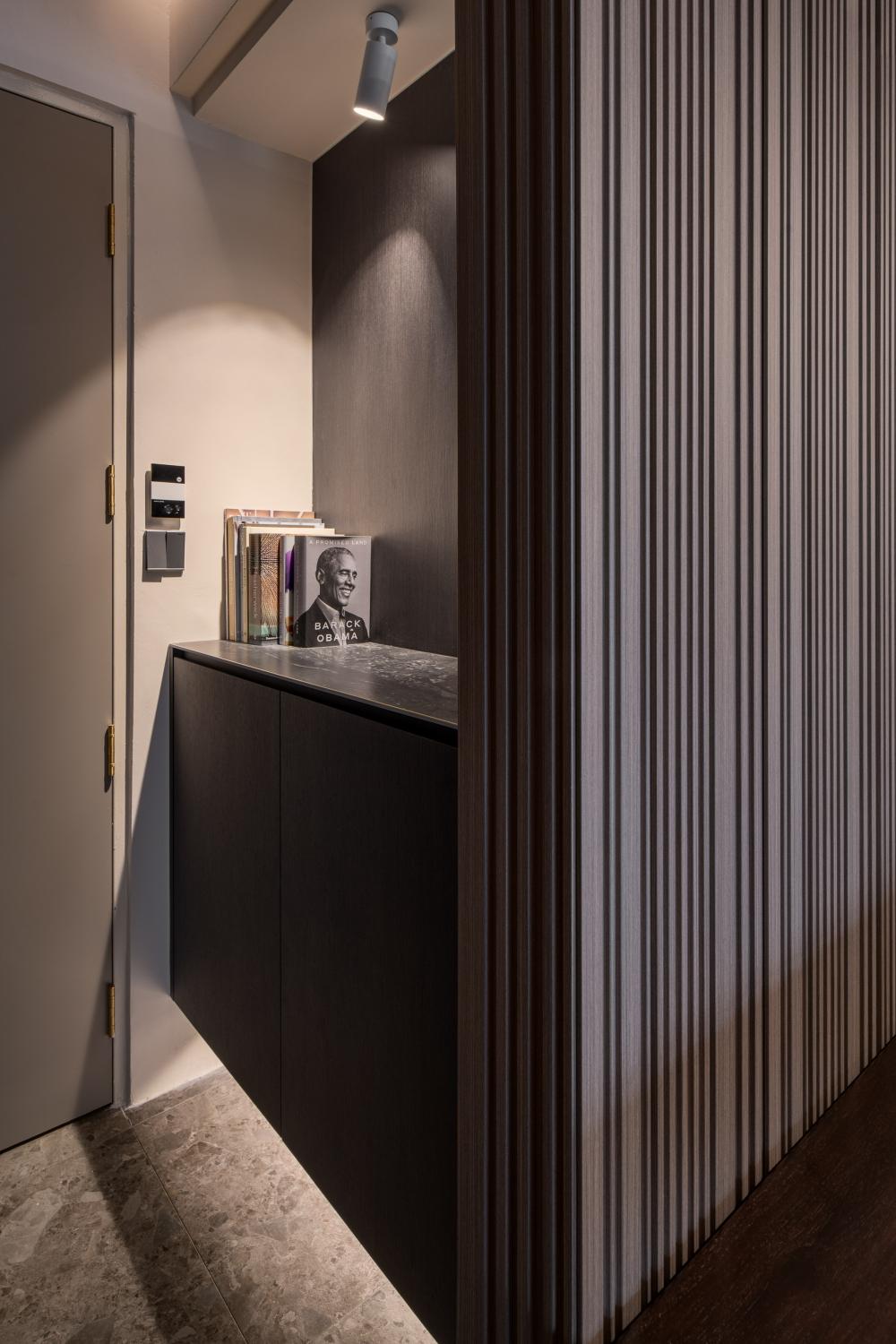 Minimalist Entryway with Countertop and Feature Wall