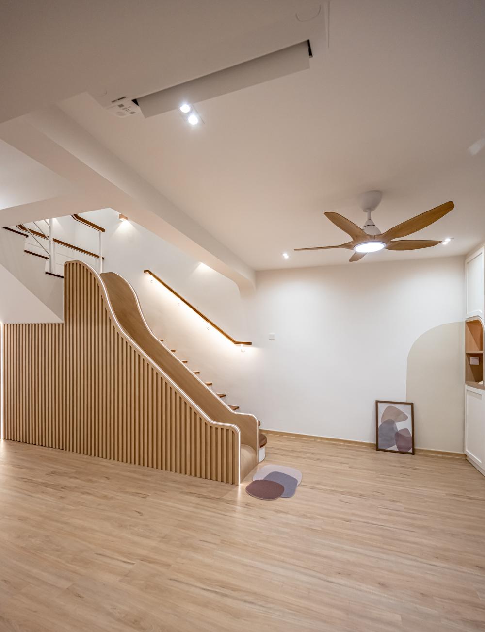Contemporary Hallway with Bookshelf and Staircase