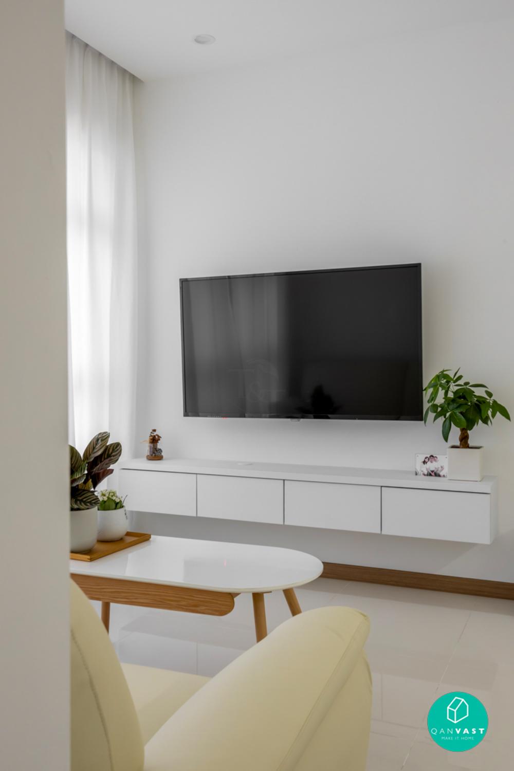 Minimalist Living Room with Homogeneous Tiles and TV Console