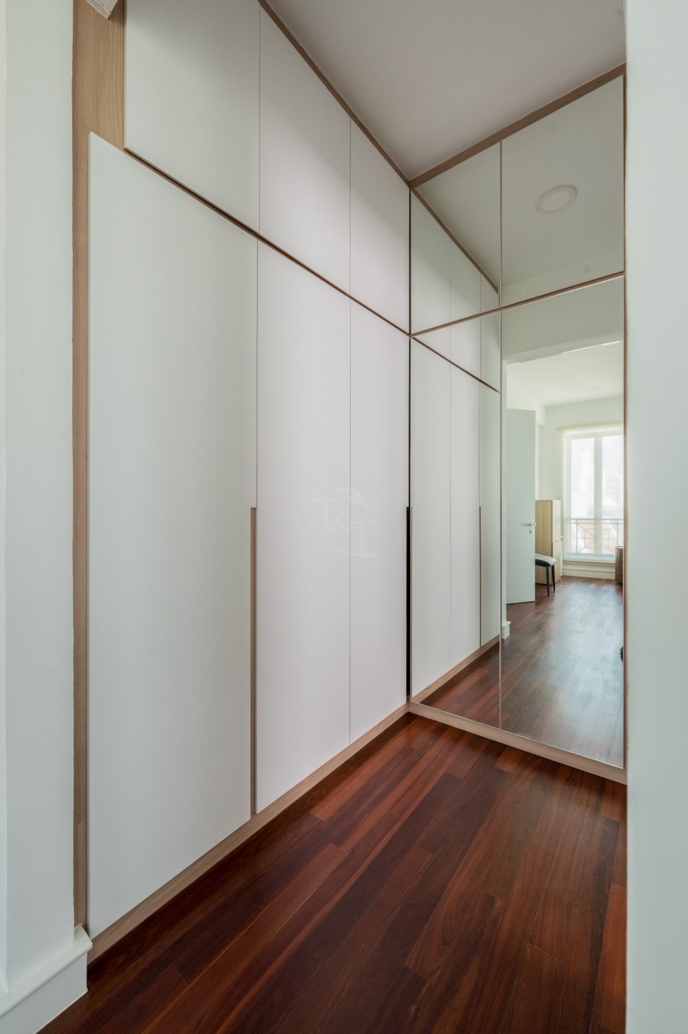 Modern Bedroom with Parquet Floor and Drop Light