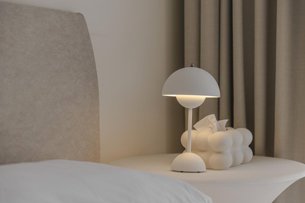 Scandinavian Bedroom with Bedside Table and Lamps