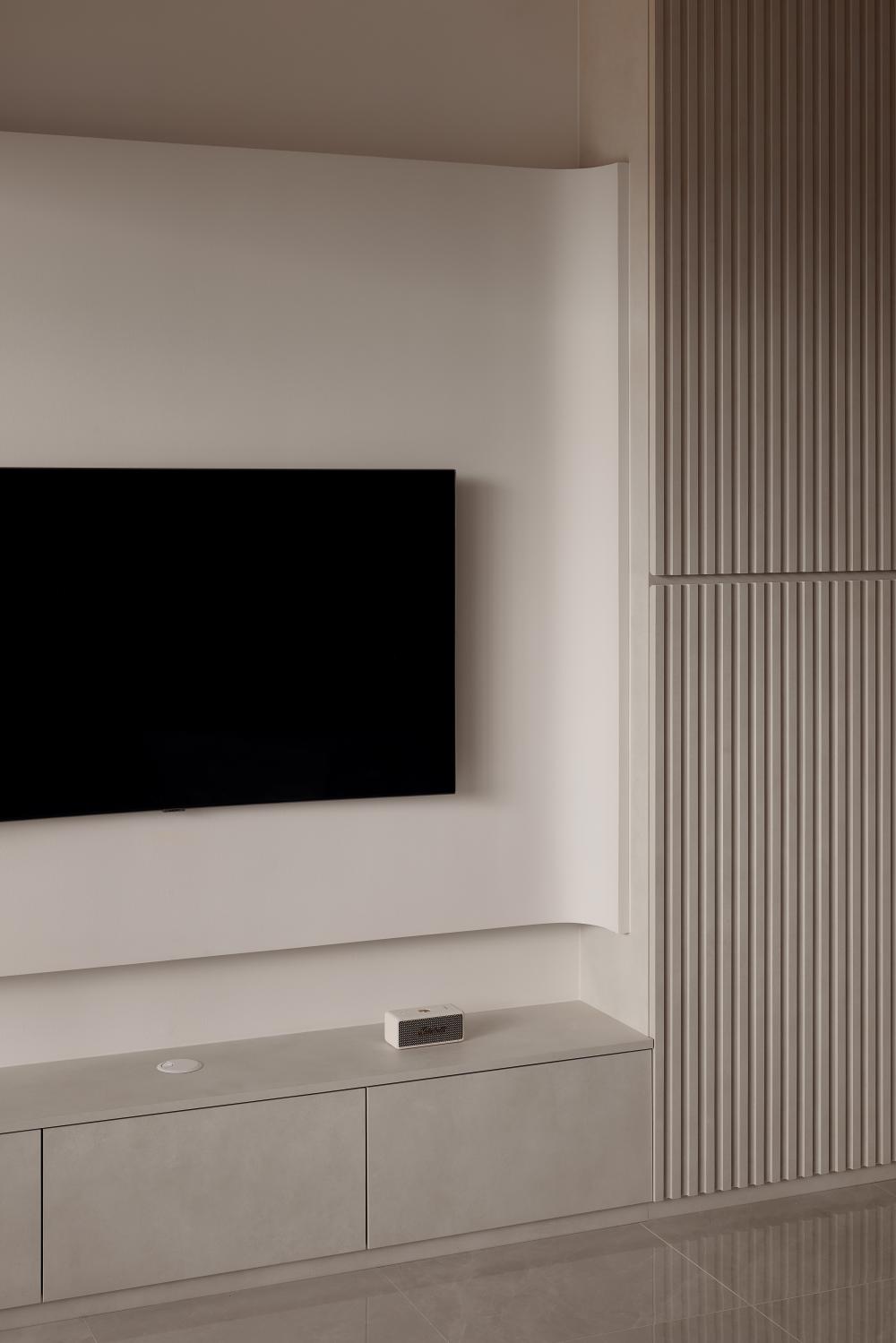 Minimalist Living Room with Homogeneous Tiles and TV Console