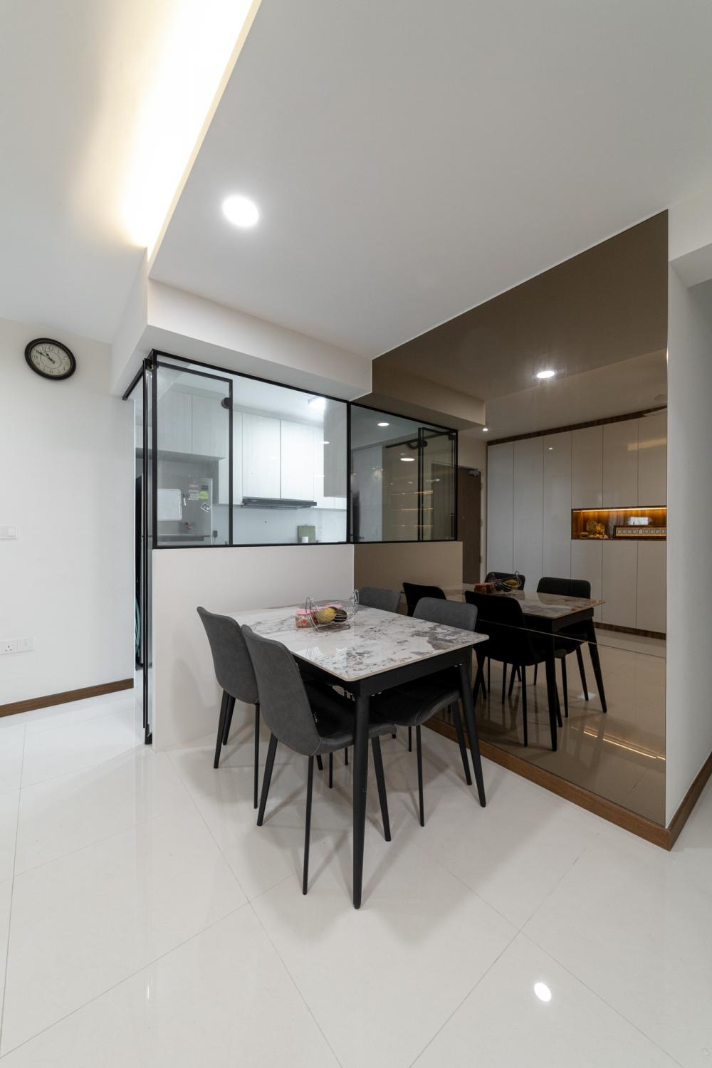 Contemporary Dining Room with Mirror and Cove Lighting