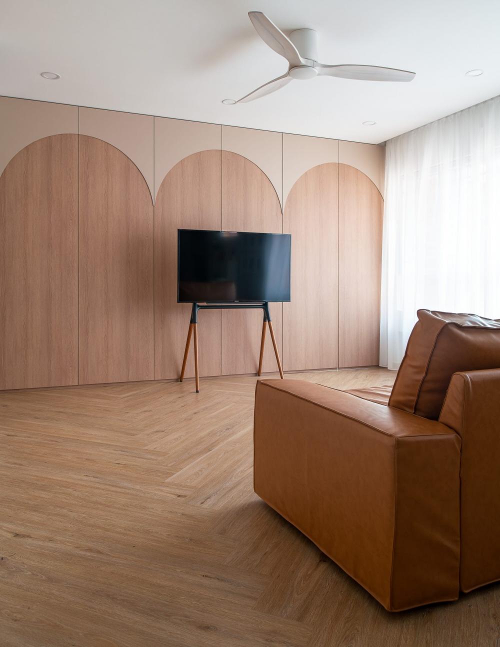 Scandinavian Living Room with Vinyl Flooring and Feature Wall