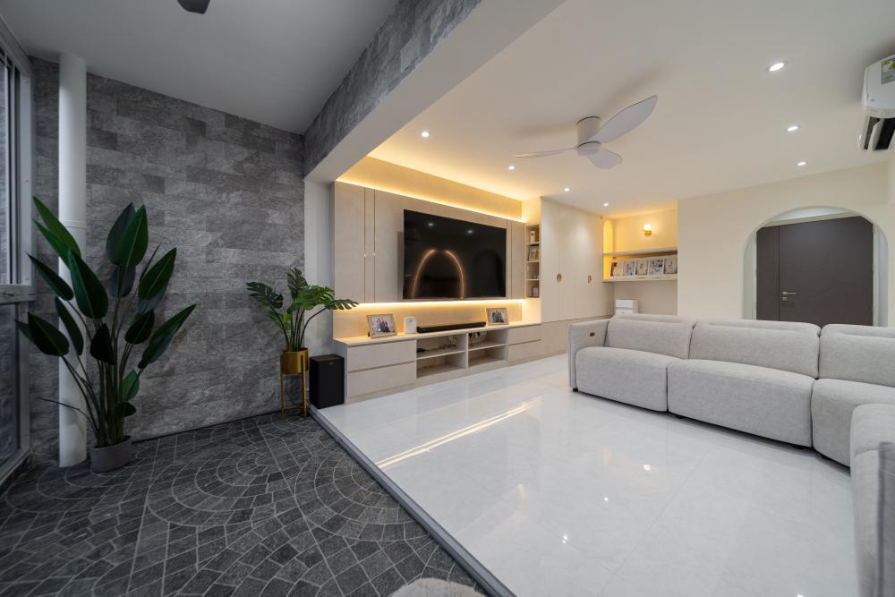 Modern Living Room with Bookshelf and Homogeneous Tiles