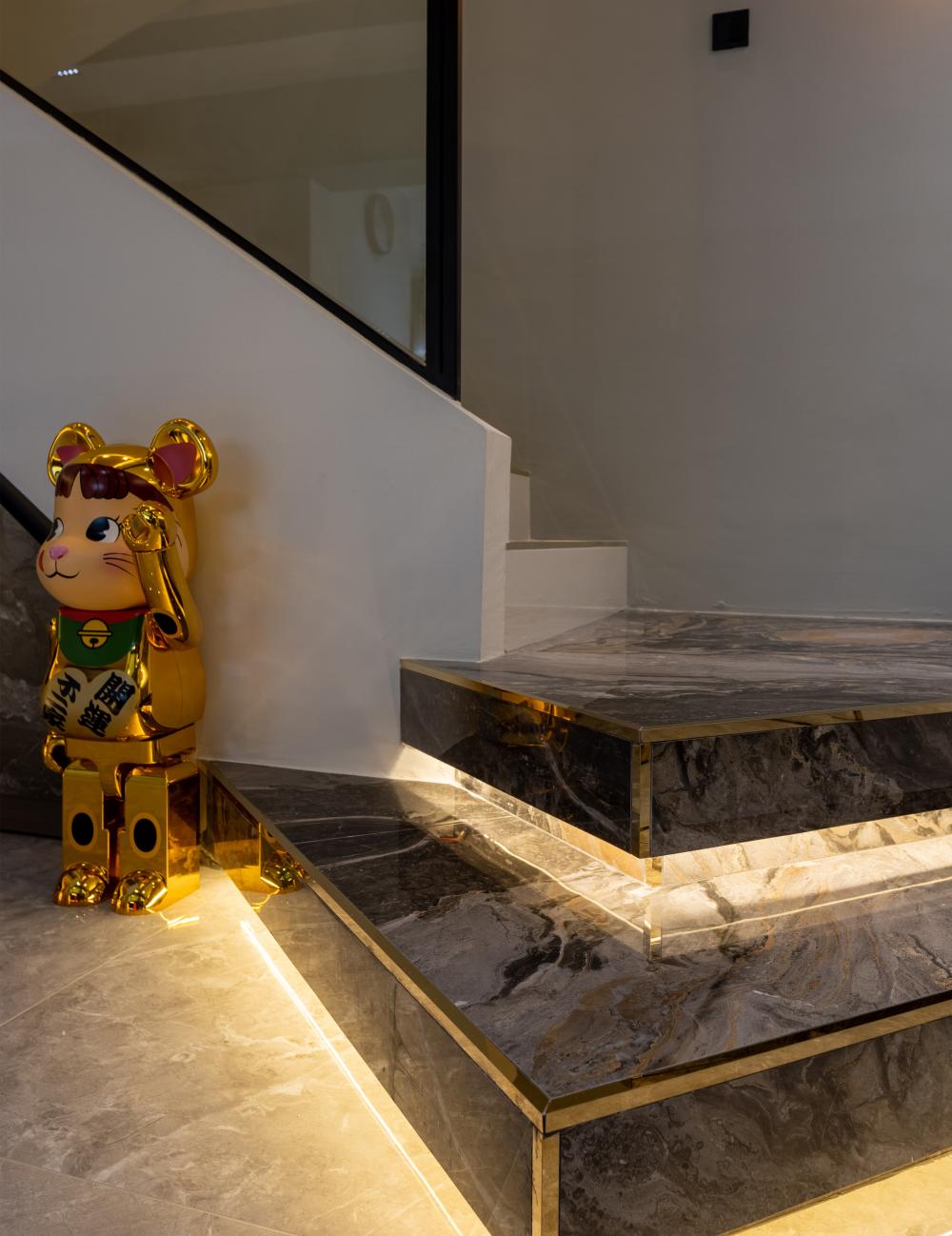 Modern Entryway with Marble Floor and Staircase