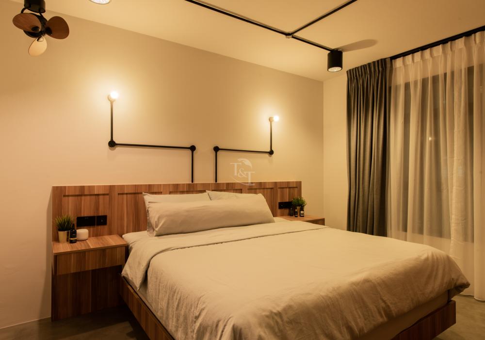 Contemporary Bedroom with Cement Floor and Feature Wall