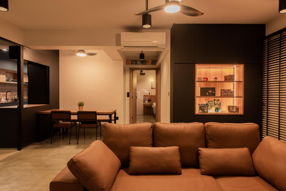 Contemporary Living Room with Bookshelf and Cement Floor