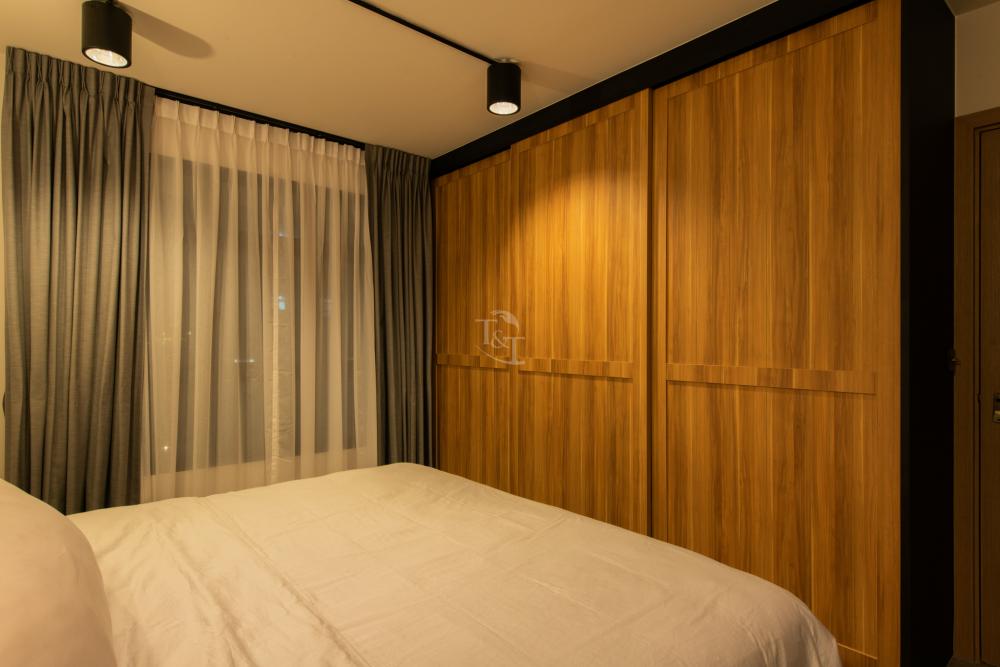 Contemporary Bedroom with Cement Floor and Bay Window
