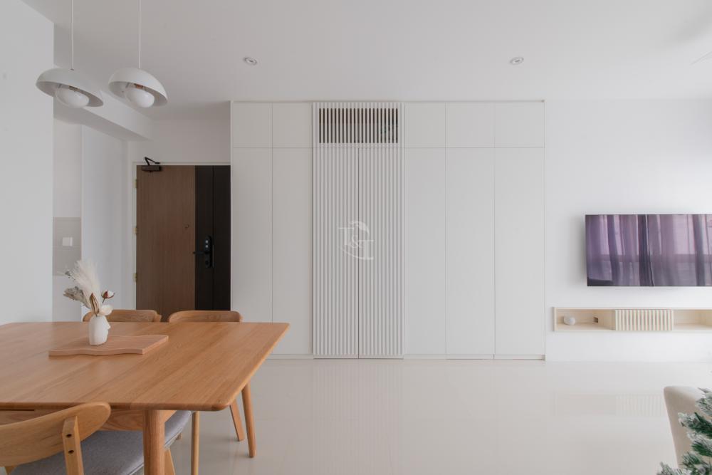 Minimalist Living Room with Homogeneous Tiles and TV Console