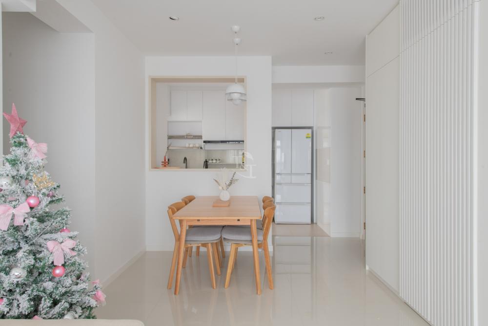 Minimalist Dining Room with Drop Light and Dining Table