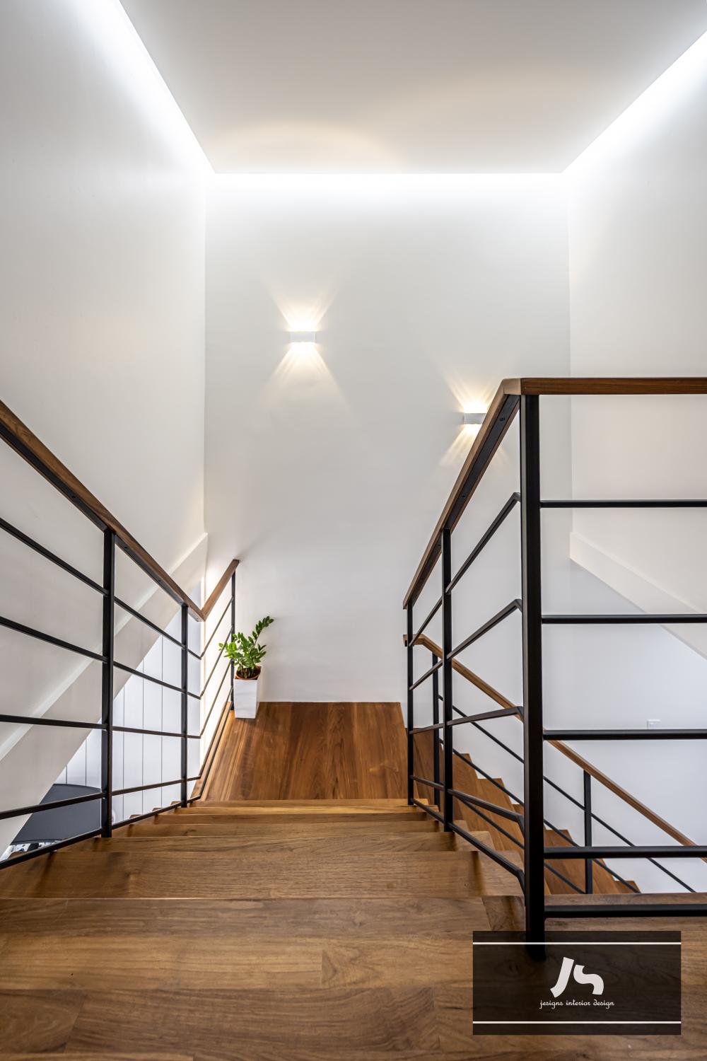 Scandinavian Hallway with Staircase and Ceiling Light